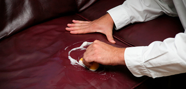 cleaning a leather sofa